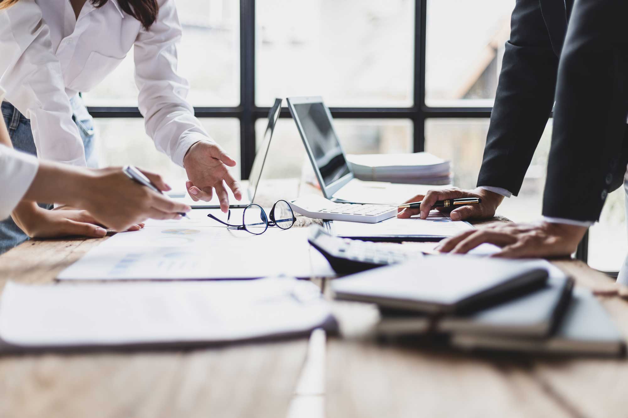 desk-financial-documents-professionals-hands